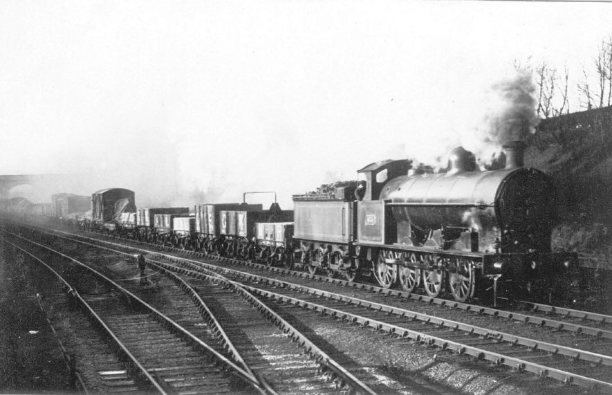 The L.N.W.R. 0-8-0 goods train passing through Shilton.  March 1922 |  IMAGE LOCATION: (Warwickshire County Record Office)