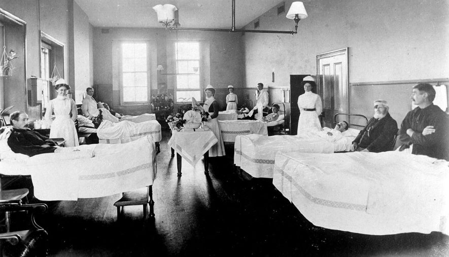 Patients and staff in Hitchman Ward at the Warneford Hospital, Leamington Spa.  1900s |  IMAGE LOCATION: (Warwickshire County Record Office)