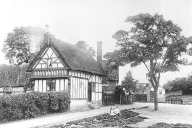 Whitnash.  Thatched and timber framed house