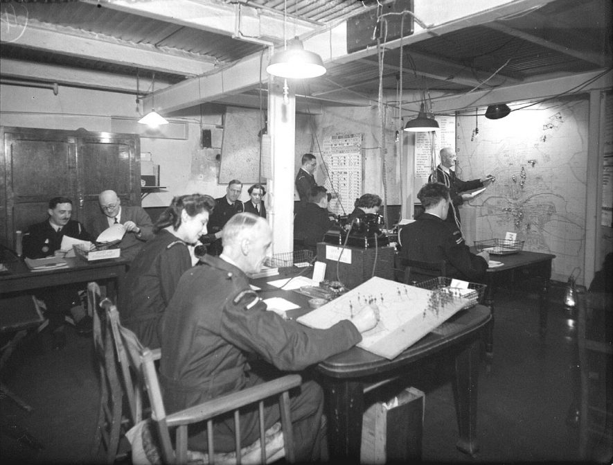 A.R.P. Control Centre, Jephson Villas, Leamington Spa. Civil Defence personnel at work.  22nd June, 1945 |  IMAGE LOCATION: (Warwickshire County Record Office)