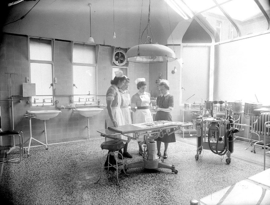 The Nurses' Home, St Mary's Road. Interior with nurses and medical equipment, Leamington Spa.  23rd September 1954 |  IMAGE LOCATION: (Warwickshire County Record Office)