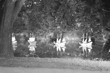 Leamington Spa.  Illuminated model boats on the river
