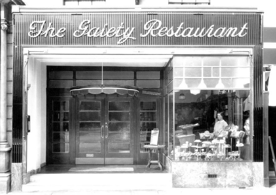 The Gaiety Restaurant, 146, The Parade, showing shop window with assistant and cake display, Leamington Spa.  1930s |  IMAGE LOCATION: (Warwickshire County Record Office)