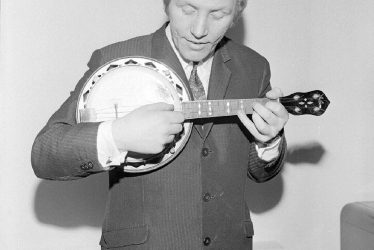 Nuneaton.  Alan Randall with George Formby's ukulele