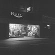 Nuneaton.  Riley's Outfitters by night