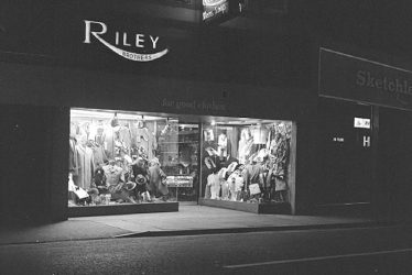Nuneaton.  Riley's Outfitters by night