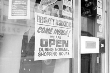 Nuneaton.  Power cut notice in shop window