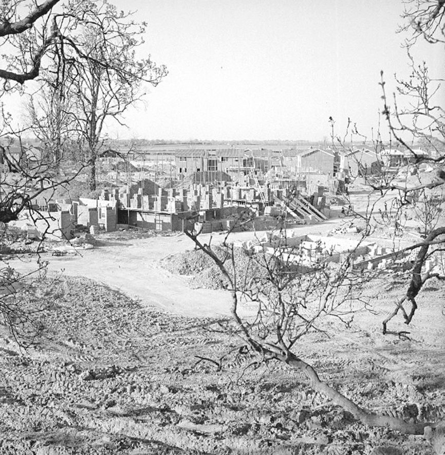View of the housing estate under construction at Wolvey Grange.  Photograph taken from the Lutterworth Road railway bridge, looking north-east, on May 15th 1980. |  IMAGE LOCATION: (Warwickshire County Record Office)