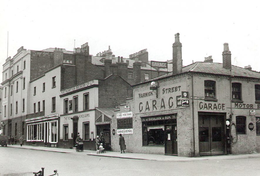 The junction of Guy Road with Warwick Street.  On the corner stood the premises of J. Sherlock and Son, Motor Engineers.  Next to the New Kings Arms public house was part of K. England's furniture shop |  IMAGE LOCATION: (Leamington Library)
