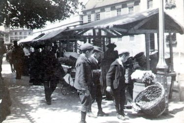 Rugby.  Church Street, boys at market