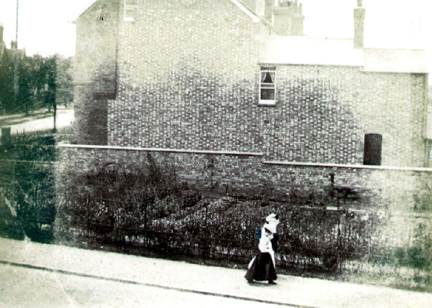 Clifton Road, Rugby.  Side of house, two women walking.  1898 |  IMAGE LOCATION: (Rugby Library)