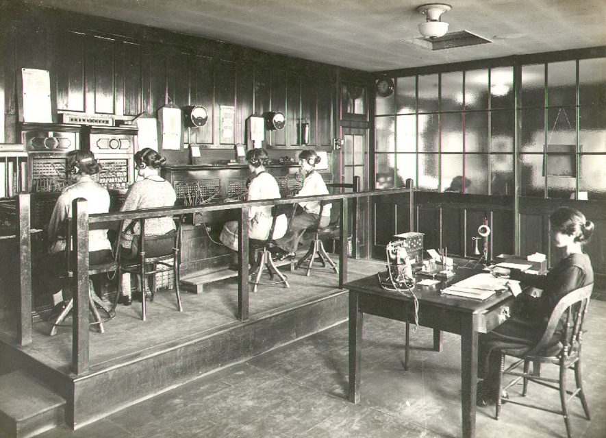 Telephone exchange at B.T.H. works,  Rugby.  1924 |  IMAGE LOCATION: (Rugby Library) PEOPLE IN PHOTO: Burton, Miss G, Burton as surname