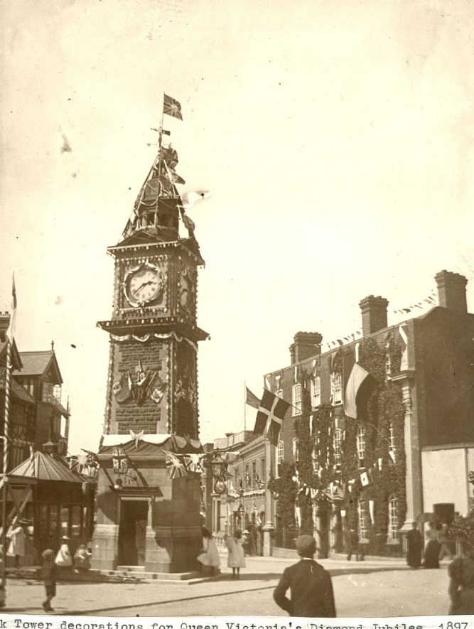 Rugby Clock Tower decorated for Queen Victoria's diamond jubilee.  1897 |  IMAGE LOCATION: (Rugby Library)