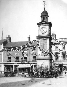 Rugby clock tower decorated for King George V jubilee.  1935 |  IMAGE LOCATION: (Rugby Library)
