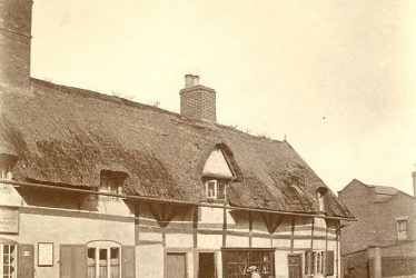 Rugby.  Thatched cottages