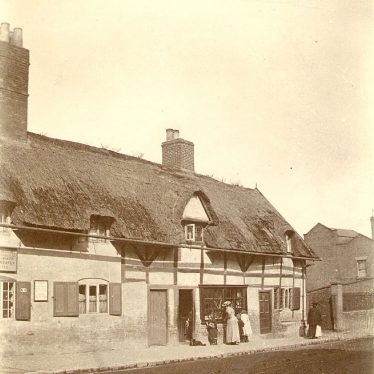 Rugby.  Thatched cottages