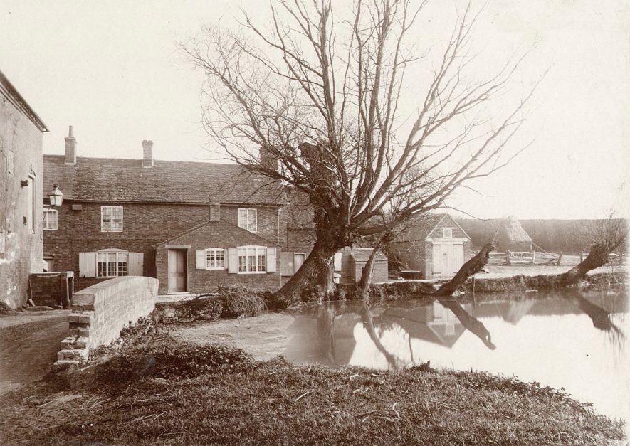 Brownsover Mill, destroyed by fire in 1956.  The first recorded miller was Robert Watson who was at the mill from the 1820's until about 1860.  He was followed by J. Denny in 1860 and J. Ivens in 1864.  From 1868 to 1878 Thomas Everard ran the mill, and from 1884 to 1892 Abraham Pittern.  No millers are known after this time and the mill was probably disused by 1910. All traces of the mill buildings have disappeared, but a bridge crosses the river at the site and the watercourses can be seen.  The pool was enlarged to form a reservoir in 1902. |  IMAGE LOCATION: (Rugby Library)