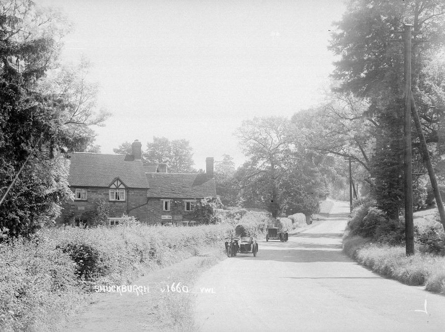 Motor cycles outside the tea rooms in Lower Shuckburgh.  1930s |  IMAGE LOCATION: (Warwickshire County Record Office)