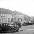 Southam.  Market Hill, with parked cars