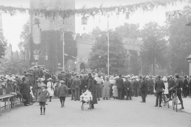 Alcester.  Gathering in front of the church