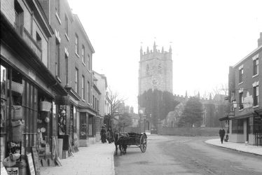 Alcester.  High Street and St Nicholas Church