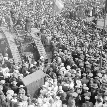 Alcester.  A crowd of people with a British Tank