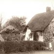 Welford on Avon.  Small thatched and timbered cottage