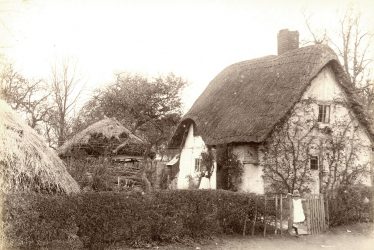 Welford on Avon.  Small thatched and timbered cottage