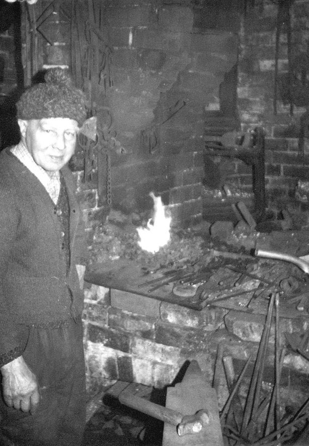 Harry Jackson at his forge in Beausale, the only working smithy in the area. C. 1960s[It is believed the Jackson family werementioned in a Romany Gypsy book called 