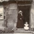 Stretton on Fosse.  Post Office, lady and child outside