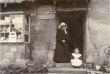 Stretton on Fosse.  Post Office, lady and child outside