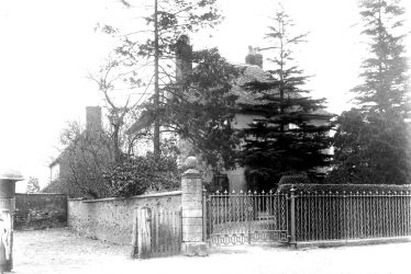 Clifford Chambers.  Gates to a house