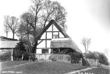 Hampton Lucy.  Timber framed thatched cottage
