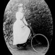 Brailes, Lower.  Mrs Findlay on a bicycle