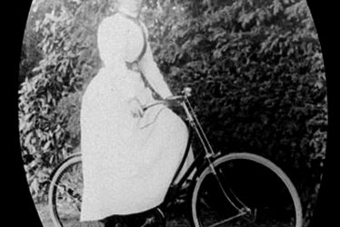 Brailes, Lower.  Mrs Findlay on a bicycle