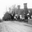 Arrow.  Timbered house