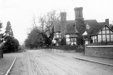 Arrow.  Timbered house