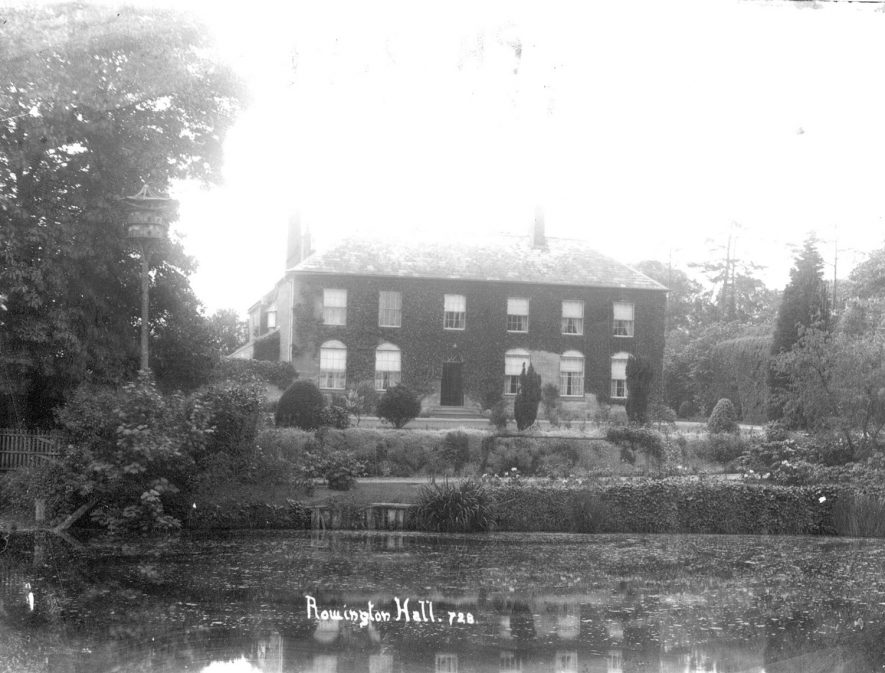 Exterior view of Rowington Hall and gardens.  1910s |  IMAGE LOCATION: (Warwickshire County Record Office)