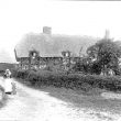 Temple Grafton.  Old thatched cottage
