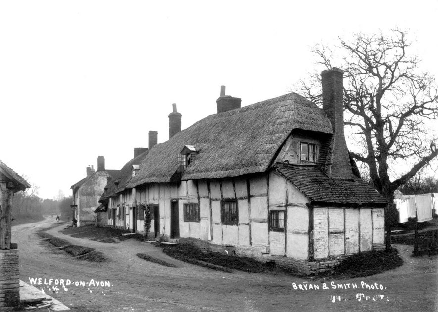 A thatched timbered cottage in Welford on Avon.  1900s |  IMAGE LOCATION: (Warwickshire County Record Office)