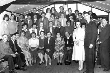 Offchurch.  Group of people in a hall