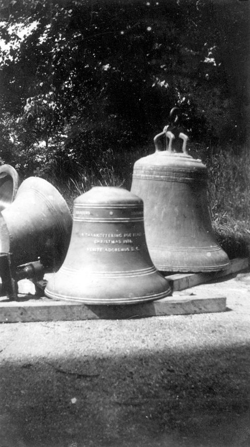 Alderminster church bells on the ground awaiting transport to Loughborough for returning and repair.  1939 |  IMAGE LOCATION: (Warwickshire County Record Office)