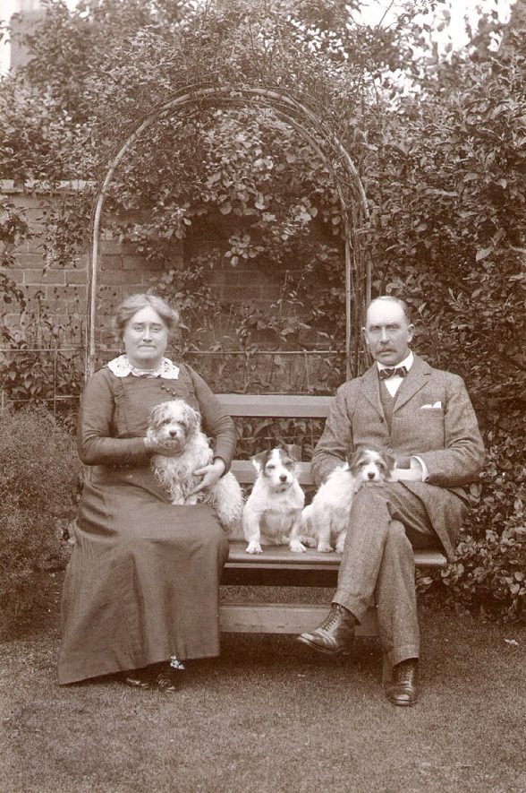 Mr and Mrs W Brooke in their garden at 13, Market Place, Rugby,  where they ran a family grocery and seed merchants business.  c.1910s |  IMAGE LOCATION: (Rugby Library) PEOPLE IN PHOTO: Brooke, W, Brooke as a surname