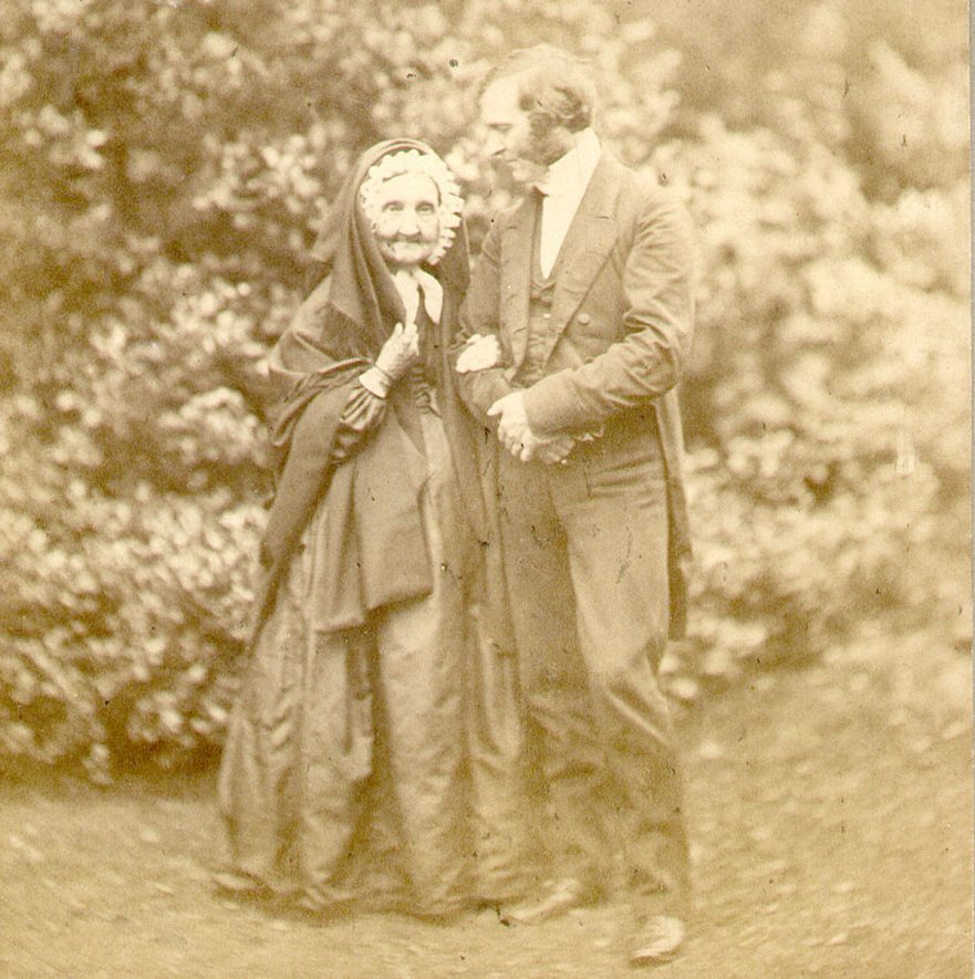 Frederick Temple, headmaster of Rugby School, 1858-70, with his mother Mrs Dorcas Temple in School House garden.  1860s |  IMAGE LOCATION: (Rugby Library)