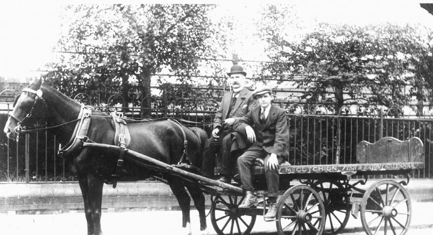 Mr McCutchion, Fish and Rabbit salesman of Murray Road, Rugby, seen with his horse and cart and young helper.  1910 |  IMAGE LOCATION: (Rugby Library) PEOPLE IN PHOTO: McCutchion, Mr, McCutchion as a surname