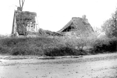 Flecknoe.  House with wooden chimney