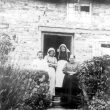 Lighthorne.  Group of women in doorway of a cottage
