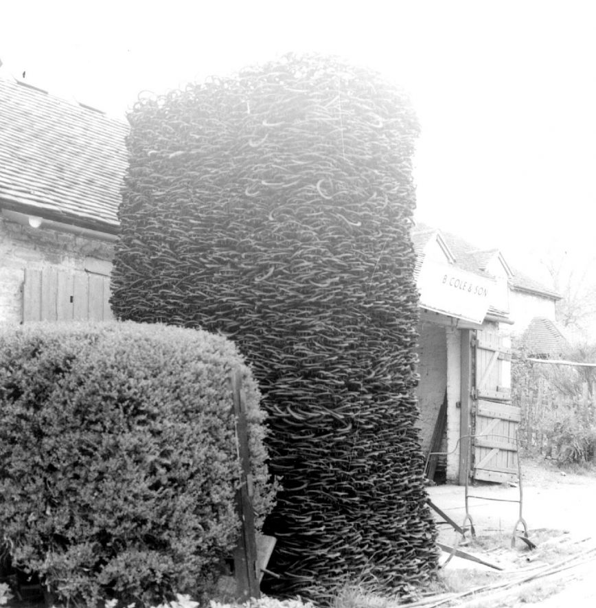 A large stack of horseshoes outside the forge at Lighthorne.  1975 |  IMAGE LOCATION: (Warwickshire Museums. Photographic Collections.)