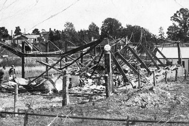 Kineton.  Remains of bus building and buses after a fire