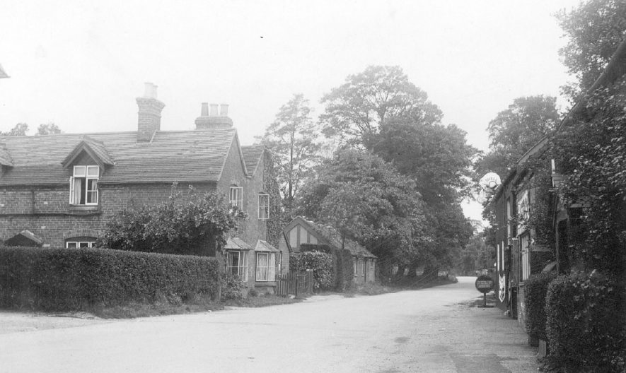 Part of village street with cottages and  